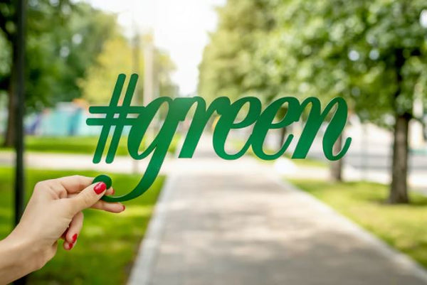 lazy ways to start recycling woman holding #green sign